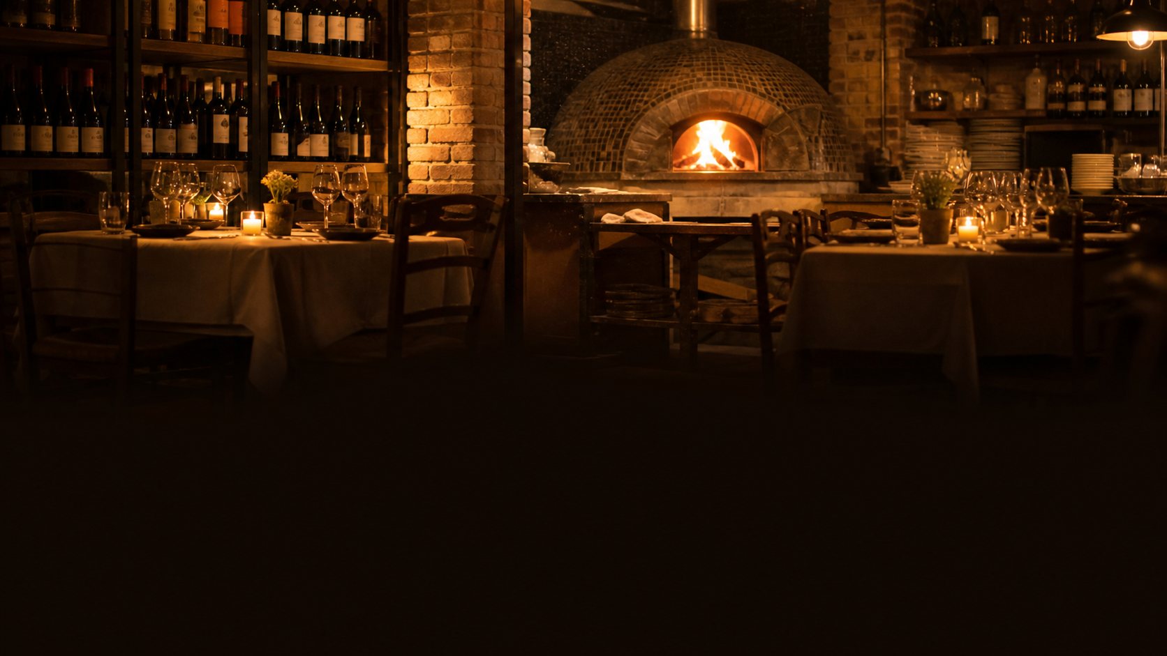 The candlelit dining room and wood-fired oven at Shardana